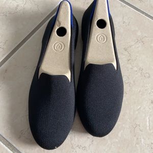 Solid black loafers